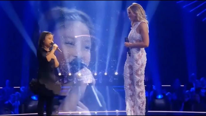 La célèbre chanteuse a demandé à la fille de chanter avec elle. En quelques secondes, absolument tous les spectateurs ont été émerveillés !